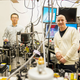 This instrument built by UW engineers (from left) Peter Pauzauskie, Xuezhe Zhou, Bennett Smith, Matthew Crane and Paden Roder (unpictured) used infrared laser light to refrigerate liquids for the first time.